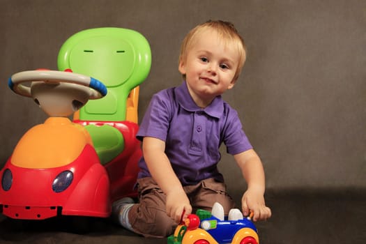 Photo of small boy looking at camera