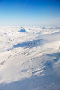 A snow covered mountain landscape - Spitsbergen, Svalbard Norway
