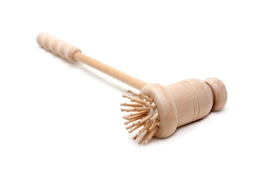 Wooden massager with fine handle insulated on white background