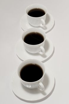 Cup of fresh coffee on white background