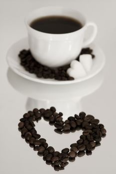 Cup of fresh coffee on white background