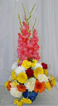 An isolated shot of an ikebana Flower Bouquet with Rose Gladiolus and assorted flowers