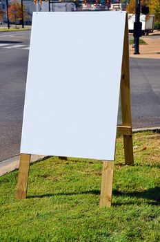 Blank sign with copy space on downtown city street.