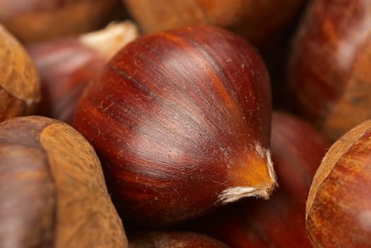 Full frame take of a heap of chestnuts, food background