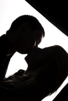 Kissing couple as a concept of love and passion