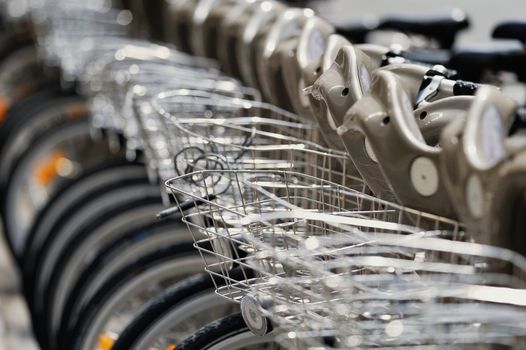 Group of bicycles in the row. Photo with tilt-shift lens