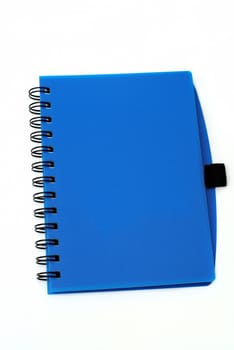 A blue book isolated ona  white back ground