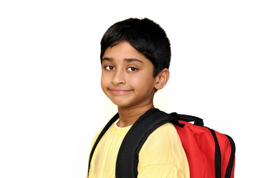 An handsome Indian kid getting ready for school
