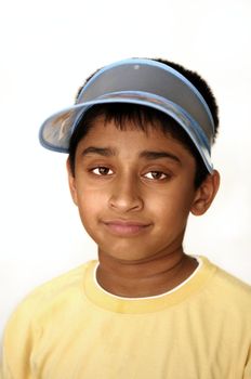 An handsome Indian kid smiling on the screen