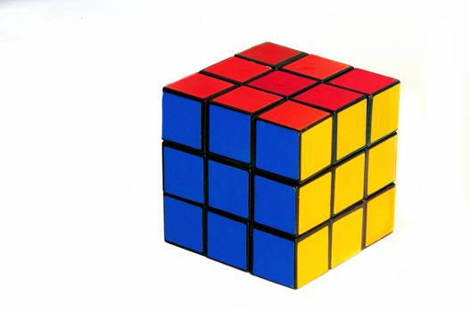 A colored cube isolated on white background