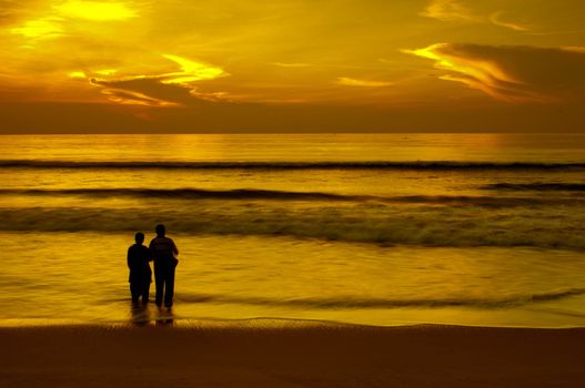 Father and son having intimacy at a local beach