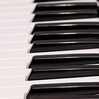 close up shot of black and white keys of a piano