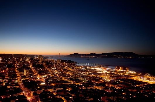 San Francisco evening skyline with the Golden Gate Bridge on the horizon