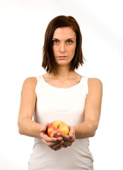 A young woman holding an apple