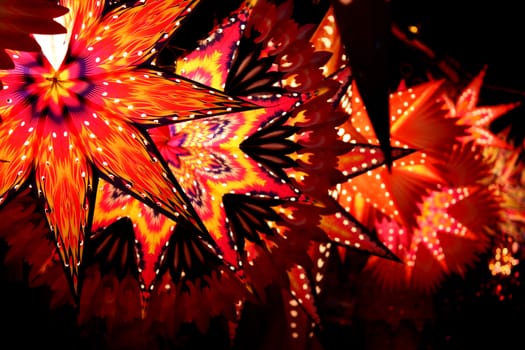 Star shaped lanterns lit on the festive occassion of Christmas / Diwali in India.