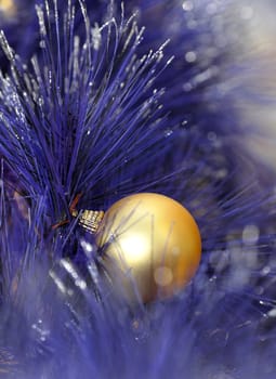 christmas ball on blue color christmas tree