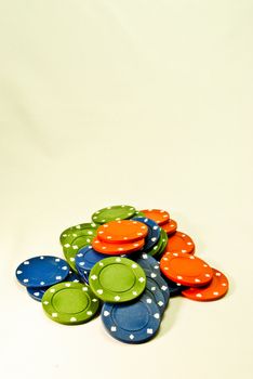 Green, red, blue pile of poker chips