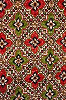 Red and green handmade traditional floral pattern