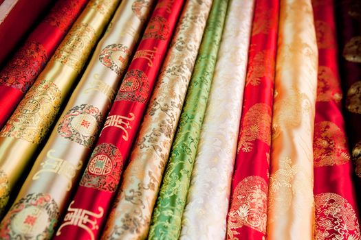 A collection of asian cloth on the roll background pattern