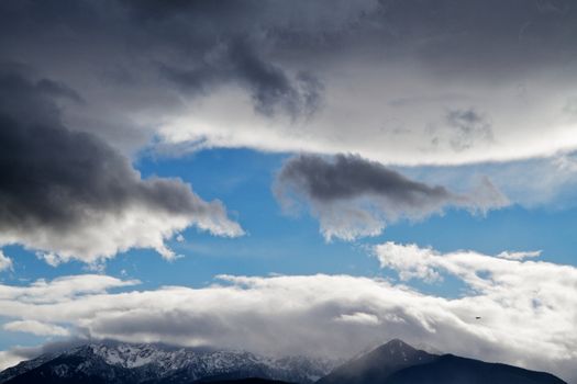 View of Hurricane ridge from Port Angeles with clouds