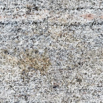 Seamless texture - a surface of a rough gray granite