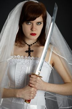 Young Bride armed eastern sword on dark background