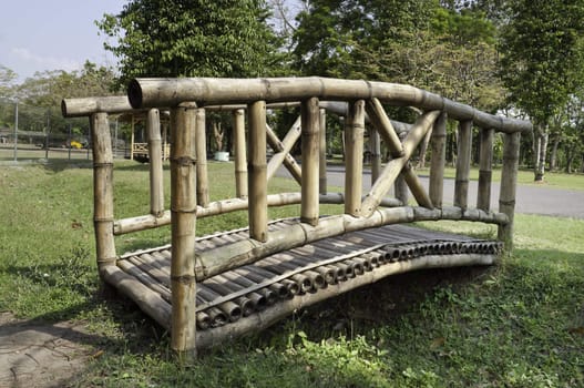 Wooden Bamboo bridge in a public garden