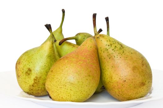 plate with fresh pears on white background