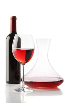 Red wine. A bottle, a glass and a decanter isolated