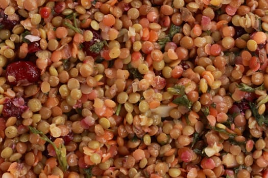 top view of green, red and brown lentil salad