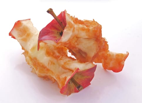 Apple cores on a plain white background.