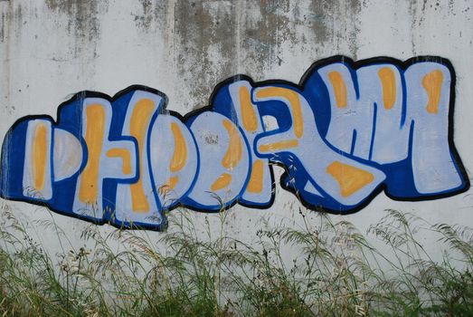 photo of a graffiti on a abandoned city wall