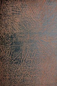 Background made from extreme closeup image with old chapped leather