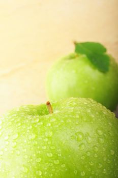 green fresh apple with water drops and copyspace