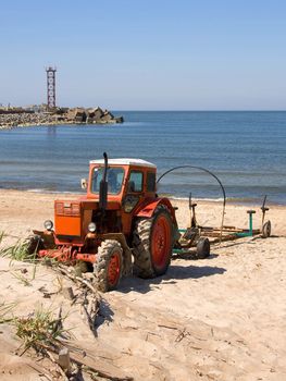 tractor at sea coast Klaipeda Lithuania