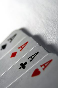 poker card game with four aces showing success