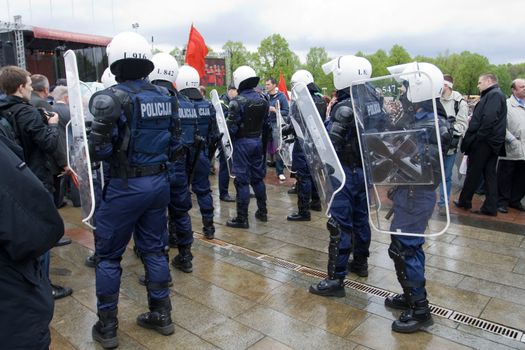 RIGA, LATVIA, MAY 9, 2009: Riot police ready to exclude provocation at Celebration of May 9 Victory Day (Eastern Europe) in Riga at Victory Memorial to Soviet Army