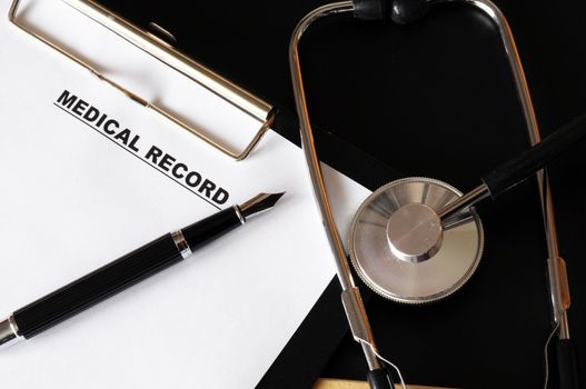 medical record clipboard and stethoscope showing health or medicine concept