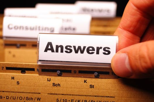 answers word on register or hanging folder showing solution concept