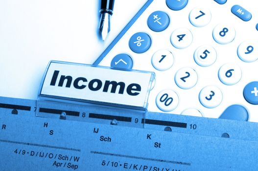 income word on business folder showing finance financial or earnings concept