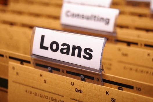 loan application in business folder showing financial investment concept
