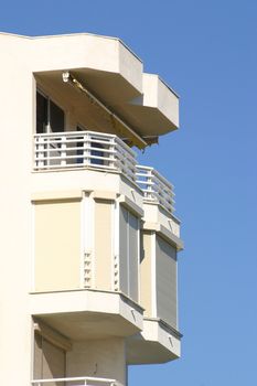 balcony at the top of a modern piece of architecture