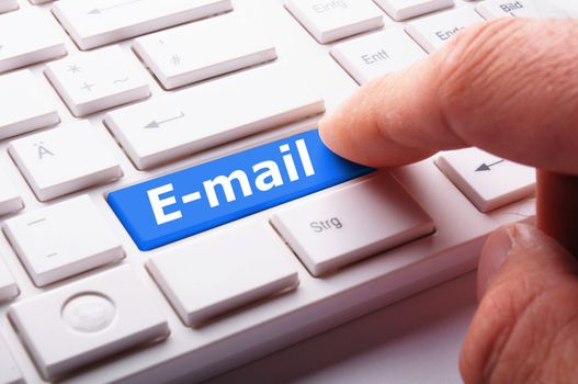 email e-mail or internet communication concept with key on keyboard