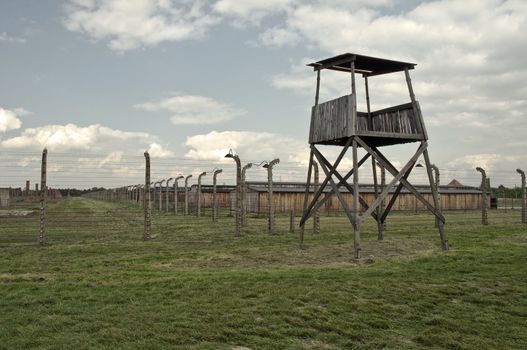 Prisoners barrack and observation tower at Auschwitz Birkenau concentration camp.