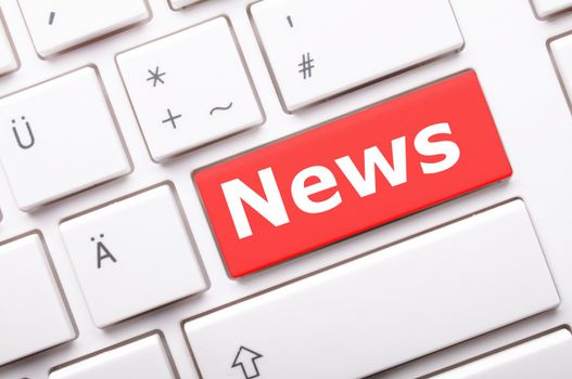 news or newsletter concept with key or keyboard from computer