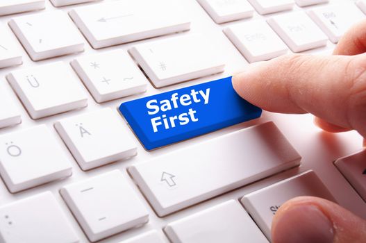 safety first concept with key showing risk danger or insurance