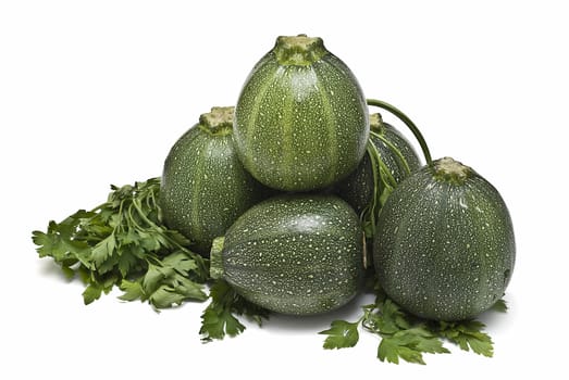 Round zucchini isolated on a white background.