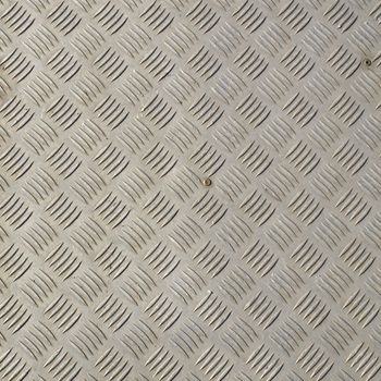 Diamond steel plate useful as a background