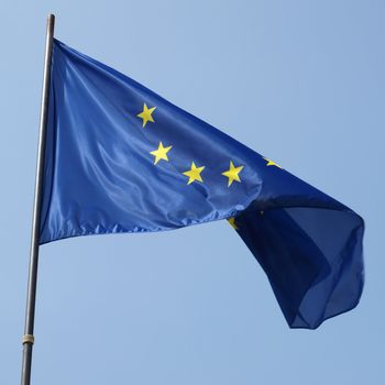 Flag of the European Union over blue sky