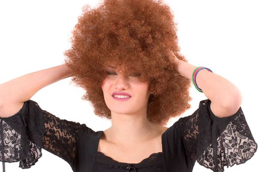 Teen with afro wig on white background